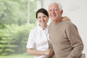 Home aide caring for old man